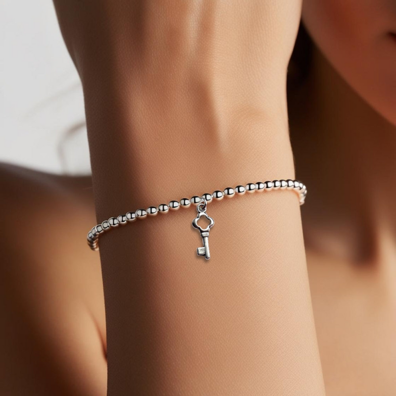 Silver beaded key charm bracelet for women with heart key pendant